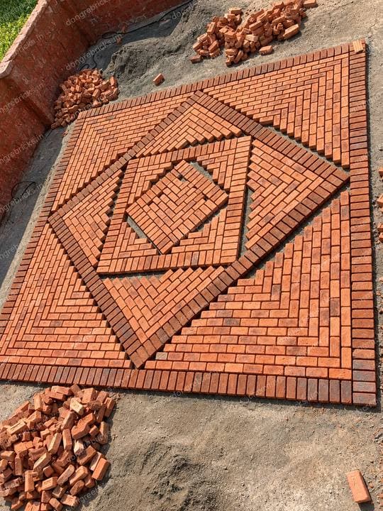 Outdoor brick paving laid in a geometric diamond pattern